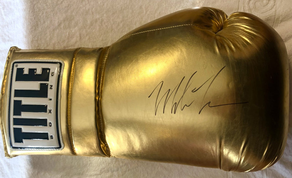Mike Tyson Wearing Golden Gloves