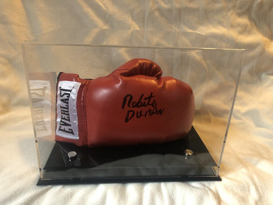 Roberto Duran autographed signed Everlast Red/Blk horizontal boxing gloves display.