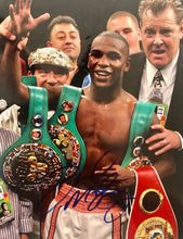 Floyd Mayweather Jr. Signed Red Reyes Boxing Glove used for sparing, official boxing glove.