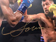 Vasyl Lomachenko action packed Autographed 8x10 fighting photo with a Gold Signature, JSA