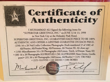 Cassius Clay Long and bold rare Autographed Everlast Boxing Glove with Dual certification.