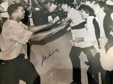 Muhammad Ali Autographed 16 x 20 size Photo in Black and white with the Beatles, SSG certified.