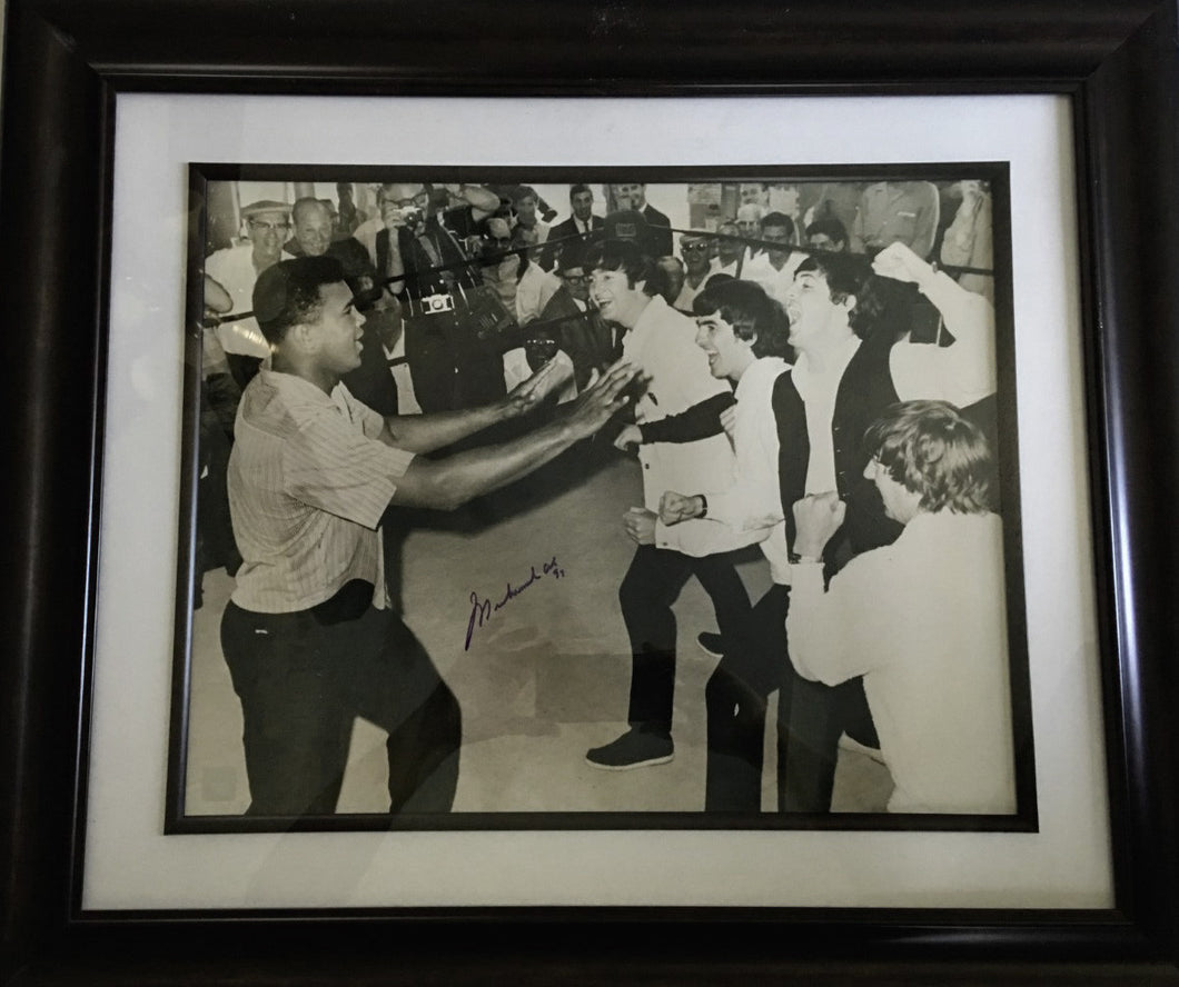 Muhammad Ali Autographed 16 x 20 size Photo in Black and white with the Beatles, SSG certified.